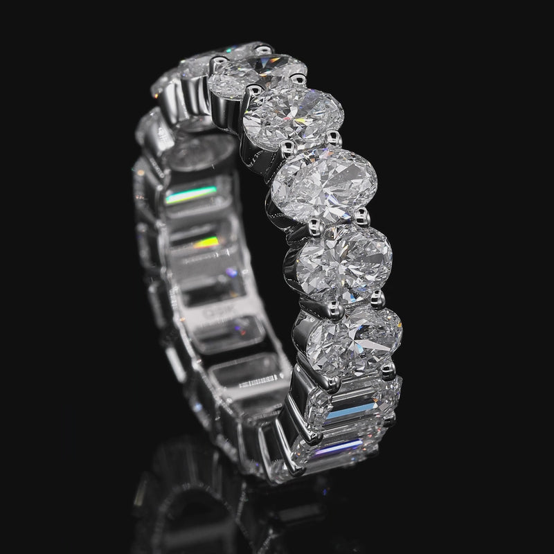 Eternell Oval and Emerald Eternity Ring